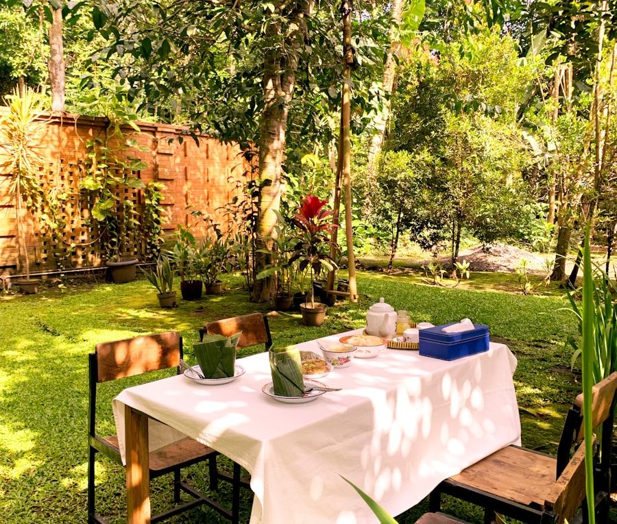 a picnic table in the middle of a garden